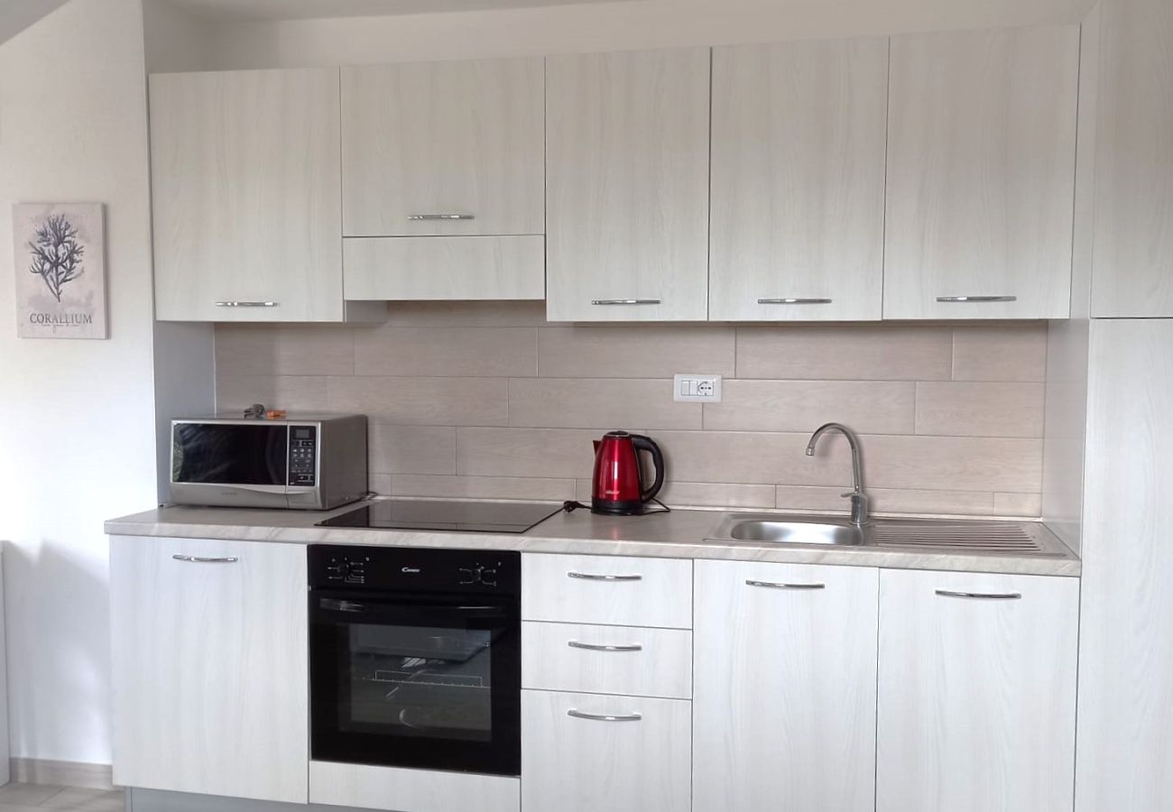 Apartment in Trinità d´Agultu e Vignola - Affittimoderni Isola Rossa Borgo - IRUL16