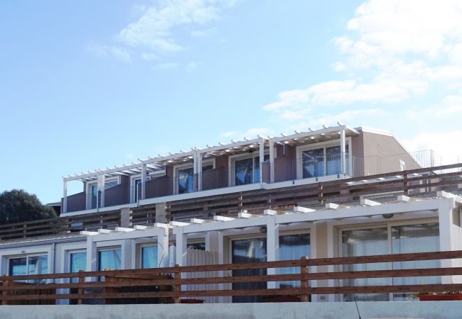 Appartement à Trinità d´Agultu e Vignola - Affittimoderni Isola Rossa  Élite - PATI24 Appartement à Trinità d´Agultu e Vignola - Affittimoderni Isola Rossa  Élite - PATI24